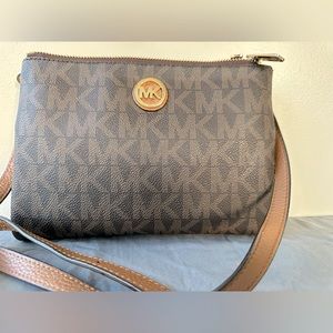 Micheal Kohrs crossbody